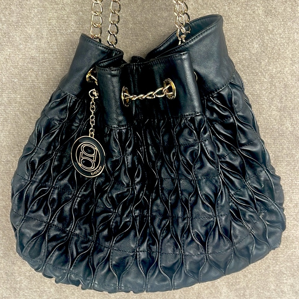 BEBE purse/handbag/shoulder bag with gold chain straps. Faux leather.